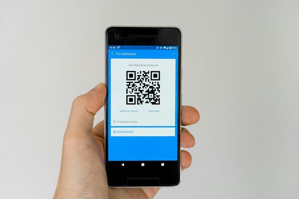 ภาพมือถือแสดง QR สำหรับชำระเงิน